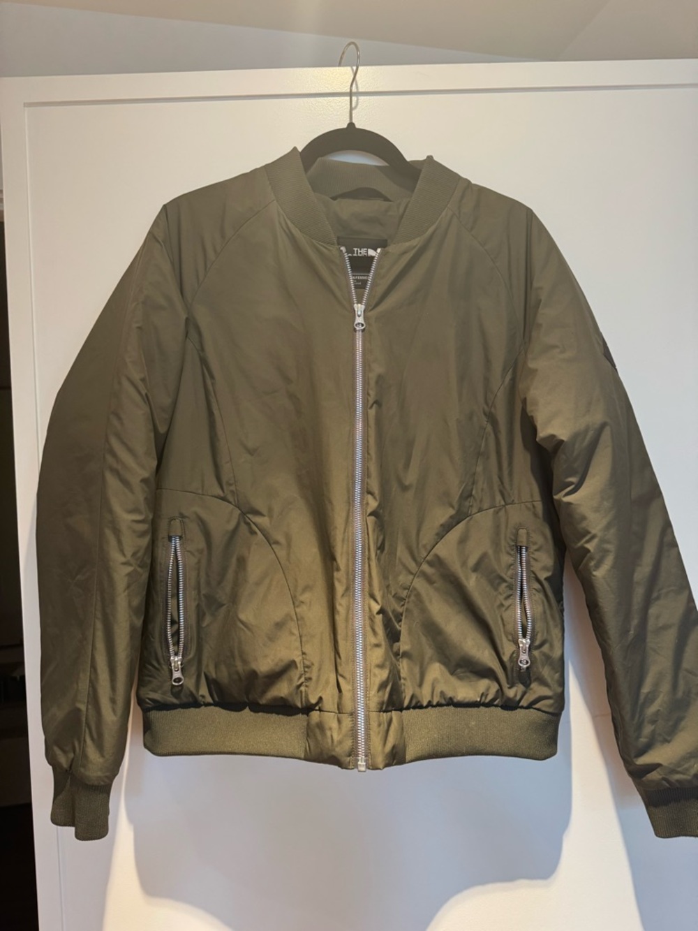The North Face Olive Bomber Jacket with Silver Zippers